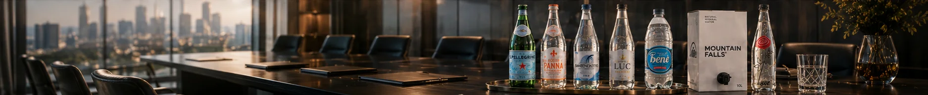 The full AquaCart range on a boardroom table with a city skyline view